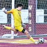 Goalkeeper Karsen Trudgeon launches a kick downfield after making a stop during the first half of the Hornets 3-0, Friday night victory over the visiting Fife Trojans. A larger photo is below. Photo by Kevin Hanson
