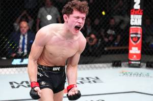 Photo by Chris Unger/Zuffa LLC via Getty Images
Chase Hooper reacts after his submission victory against Jordan Leavitt in a lightweight fight during the UFC Fight Night event at UFC APEX on Nov. 18, 2023 in Las Vegas, Nevada.