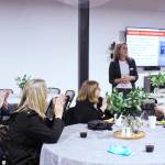 Rainier Foothills Wellness Foundations Executive Director Sara Stratton giving a warm welcome to her guests at the nonprofits new location on Griffin Avenue. Photo by Ray Miller-Still