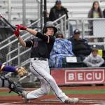 Photo by Travis McQueen / travis-mcqueen.com 
EHS baseball team was finally bested by Columbia at Joe Martin Stadium in Bellingham last weekend, 3 - 2. Pictured is Garett Chavis hitting a ball to right field in the bottom of the 6th inning.
