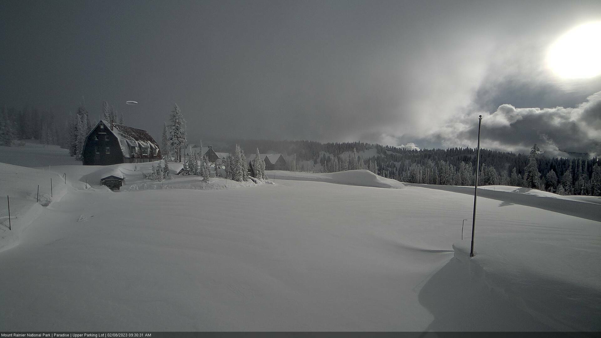 An alleged UFO was spotted at Mt. Rainier on Feb. 3, 2024, via a Paradise parking lot webcam. You can see the shape above the building; according to the reporter, the shape was gone when the photo was refreshed a minute later. Image courtesy The National UFO Reporting Center (NUFORC)