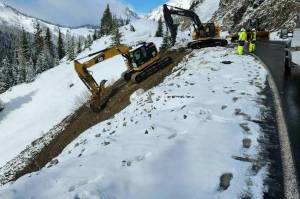 Photo courtesy the National Park Service
Road crews repairing a 10-mile section of SR 410 after a washout.