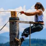 Photo by Ashley Britschgi
Bo Carlson, pictured here competing in the tree topping event, is Billy Clinkingbeards biggest competition. Last year he fell behind by five points for the All Around Logger title, but he bested Clinkingbeard in the horizontal block chop, and was also first in the single bucking and Ma and Pa bucking events.