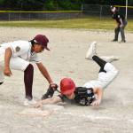 Photos by Kevin Hanson
A Chinook Little League all-star squad hosted a South Hill team in a best-of-three series, with the winner guaranteed a berth in the upcoming state Little League tournament. The series opener was played June 13 at the historic diamond at the Enumclaw Expo Center and resulted in a 15-10 victory for the Chinook squad. A second game was planned for Friday and a third contest, if necessary, was scheduled for Tuesday. Due to early deadlines, only the Thursday game could be reported. In these Thursday photos, Chinooks CJ Anderson dives safely back to first base, beating a pickoff attempt; Sawyer OGrady puts a ball in play; and starting pitcher Beckham Toone delivers a first-inning pitch.