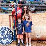 Photo courtesy
Billy Clinkingbeard with his wife Baratyah and children Liam and Mila after receiving his tenth All Around Logger award.