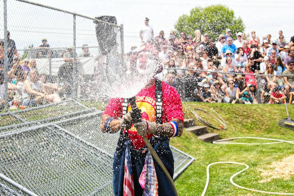 Photo by Ray Miller-Still
Timbrrr helping cool off the crowd on a hot day.