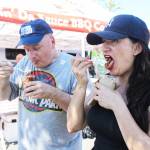 Angelica and Duwane Smith walking through Ten Trails and enjoying a Slaw Sundae from Hoggin Da Sauce BBQ.