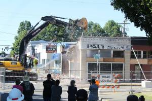Photos by Ray Miller-Still 
The old Paulson Chevrolet dealership building, which used to be Enumclaws first general store, an opera house, Gamblin Motors, and a flooring business over the years, is no longer after demolition crews took down the building on Aug. 28.