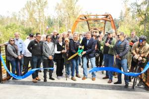 Photo by Ray Miller-Still
The crowd at the Foothills Trail bridge grand opening last Saturday found themselves practically shoulder to shoulder as they gathered on the new structure for the ribbon cutting. The bridge now connects pedestrians from Enumclaw and Buckley, and doubles as an emergency route for first responders of the traffic bridge fails.