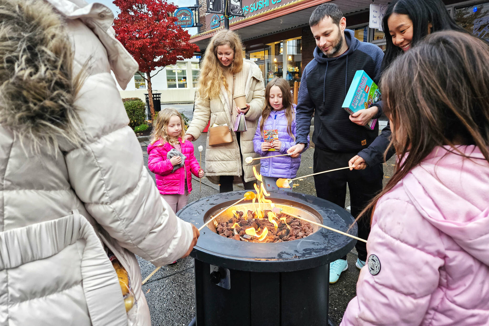 This years Winter Stoke Block Party is scheduled for Nov. 9 and features, among vendors and live music, marshmallow roasting. Here are some photos from last year. Photos by Ray Miller-Still