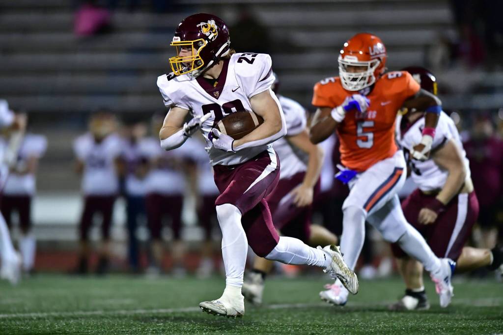 Likely one of WRHS roughest game this season, the Hornets lost to the Lancers, booting them from the state tourney. Photo courtesy Stacy Tyler / intensitysportsphotography.com
