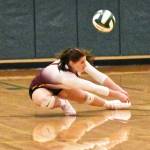PHOTO BY KEVIN HANSON 
The Plateau volleyball teams opened district competition Nov. 15 in Tacoma, with Enumclaw playing at Foss High and White River taking the court at Mount Tahoma. In this photos Enumclaws Haley Osborne goes low to handle a Lakes serve.