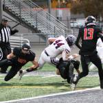 Photo by Todd Overdorf / onscapeinages.com
#44 Seamus Twohey dives for the end zone for an Enumclaw score.