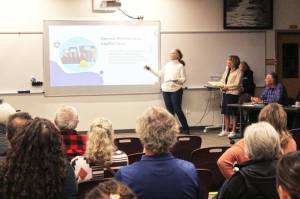 Sarah Tolbert and Cathy Dahlquist presented the Facility Oversight for Capital Utilization and Sustainability (FOCUS) Committees final report on Nov. 18 to the Enumclaw School District Board of Directors and a couple dozen attendees. Photo by Ray Miller-Still