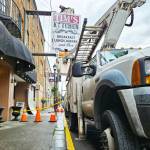 Photo by Ray Miller-Still 
Tims Kitchen putting up its own sign up after The Lee restaurant closed late May.