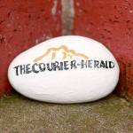 Tiny logo, tiny news. Photo courtesy Ray Miller-Still