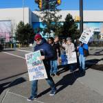 Several different causes were represented at the Renton protest, including voting rights and racial justice. Photo by Bailey Jo Josie/Sound Publishing.