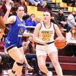 Photo by Kevin Hanson
The White River High girls kept their North Puget Sound League 3A record unblemished Thursday night with a 71-53 victory over the visiting squad from Federal Way. In this photo, the Hornet Dakota Sprouse (32) looks for an open lane to the hoop.