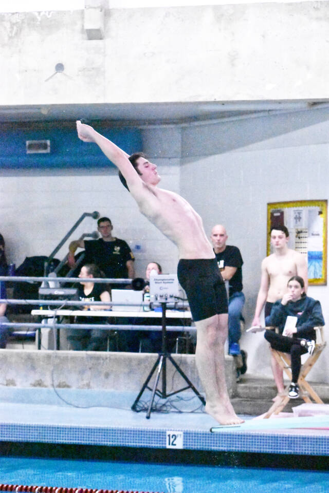The swim and dive teams from Enumclaw High and White River took on the Federal Way Eagles on Jan. 16. Among those competing at the Enumclaw Aquatic Center was EHS diver Riley Jensen. Photo by Kevin Hanson