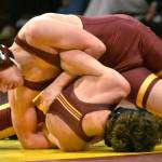 White Rivers Morgan Presly on his way to a victory at 126 pounds. Photo by Kevin Hanson
