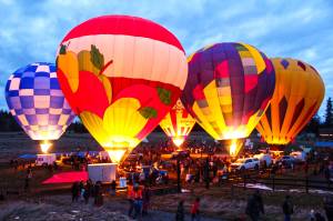 Photos by Ray Miller-Still
Thomasson Family Farm was glowing last Friday, Feb. 7, with the light of six 100-foot hot air balloons. The event was organized to raise money and wipe out Enumclaw student meal debt.