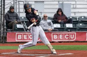 Photo (c) 2024 Travis McQueen
Drew Francis hitting a double line drive to center field to score two runs in the bottom of the 1st inning of last years penultimate state matchup against Anacortes.