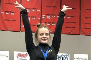 Enumclaw High gymnast Aly Posey captured all-around honors at the state meet and received all-league recognition in the process. Shes pictured here on the awards podium at the state meet.
SUBMITTED PHOTO
