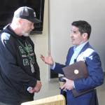 Photo by Ray Miller-Still
After a roundtable with the movers and shakers of Buckley, city Council member Ron Smith takes a moment to talk to Pierce County Executive Ryan Mello about law enforcement issues.