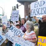 Most protestors came to show their opposition to the federal government; others came to support the Enumclaw School District's Proposition No. 1, which is a proposed property tax to fund maintenance around the district like replacing roofs and fire alarm systems. Photo by Ray Miller-Still
