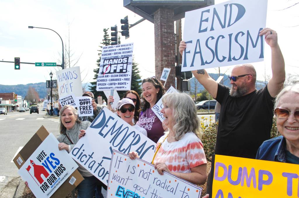 Most protestors came to show their opposition to the federal government; others came to support the Enumclaw School District's Proposition No. 1, which is a proposed property tax to fund maintenance around the district like replacing roofs and fire alarm systems. Photo by Ray Miller-Still