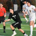 PHOTOS BY KEVIN HANSON 
The Hornets from Pierce County came out on top Friday night when Enumclaw High and White River squared off on the Expo Center pitch. The Buckley crew built a healthy lead but EHS rallied late, eventually falling on the short end of a 4-3 score. In these photos, White Rivers Caymen Floyd (#2) looks to corral a loose ball as Enumclaws Junior Gorobets (#8) closes in; in the background are White Rivers Bryan Rodriguez-Pena (#10) and Enumclaws Sam Blair (#23); also pictured, Gorobets heads upfield during the first half while White Rivers Lane Beus (#3) gives chase.