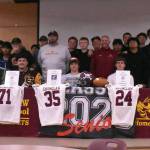 PHOTO BY KEVIN HANSON 
Enumclaw High athletes, joined by teammates and coaches, signed last week with collegiate programs. Seated, from left, are Seamus Twohey, Fernando Reyes Villasenor, Caleb Christian, Louis Chevalier, Marcell Lensegrav-Obot and Porter Rodarte.