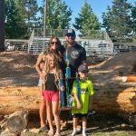 Photo by Ashley Britschgi 
Billy Clinkingbeard took his 11th All Around Logger win this year. With him is his wife Baratyah and children Liam and Mia.