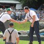 Photo by Ray Miller-Still 
Sometimes the Log Show is a family affair. Pictured here are brothers Ryker and Ryder Popke wishing each other luck before the choker setting event.