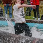 Riley Skogen placed third in the log rolling event. Photo by Ashley Britschgi