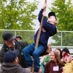 Colt Fetter took first in his ages rope climb with a 11.84 seconds score. Photo by Ashley Britschgi