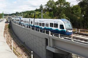 A light rail vehicle parked Aug. 18 on the alignment during the construction of the Star Lake Station in Kent. COURTESY PHOTO, Sound Transit