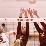 White Rivers Emery Stevenson (5) sends a spike over the outstretched arms of EHS blockers Kaylee Wall (2) and Halle Martel (12). Also, Enumclaws Haley Dumontet (3) sets up a teammate for a play at the net.