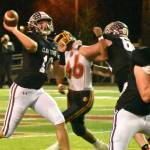 PHOTOs BY KEVIN HANSON 
With plenty of protection, Hornet senior quarterback Gavin Trachte unleashes a pass against Thomas Jefferson.