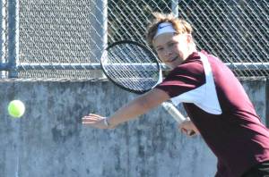 PHOTO BY KEVIN HANSON William Stuenkel, pictured here during an early-season match, has been one-half of Enumclaws successful No. 1 doubles team, pairing with King Gisa.