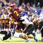 PHOTO COURTESY VINCE MILLER Kovi Poulin (2) fights his way inside the 10-yard line during White Rivers victory over Federal Way.