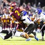 PHOTO COURTESY VINCE MILLER Kovi Poulin (2) fights his way inside the 10-yard line during White Rivers victory over Federal Way.