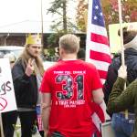It was not an uncommon sight to see demonstrators and counter-demonstrators in conversation. Photo by Ray Mille-Still
