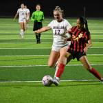 Jordynn Koria makes a stop on Rylee DeVol of Enumclaw. Ben Ray / The Mirror