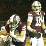 PHOTO BY KEVIN HANSON EHS running back Paxton Patterson gained some tough yardage after taking a handoff from quarterback Gavin Trachte (10) during a the game against Auburn Mountainview on Oct. 16.