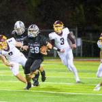 Enumclaw senior Cole Chiechi gaining some yardage before being taken down by White River.