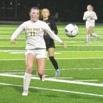 PHOTOs BY KEVIN HANSON 
Belle Knauss, a senior defender for White River, looks to corral a loose ball during the Hornets Thursday night playoff game.