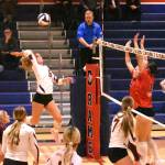 PHOTOs BY KEVIN HANSON 
White River junior Jordyn Kaelin goes high for a kill during the Hornets district tourney victory over the Silas Rams.