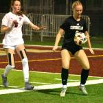 PHOTO BY KEVIN HANSON
EHS forward Sutton Kelsey races past a Prairie High defender during the Hornets November 12, home-field victory.
Enumclaw senior Clare Largent, one of the Hornet team captains, controls a loose ball during the teams state tournament opener at the Expo Center.
