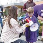 Pictured handling the bullhorn is Cillian Hendrickson, 3, who was there with his mother Amanda, an emergency room nurse. Photo by Ray Miller-Still
